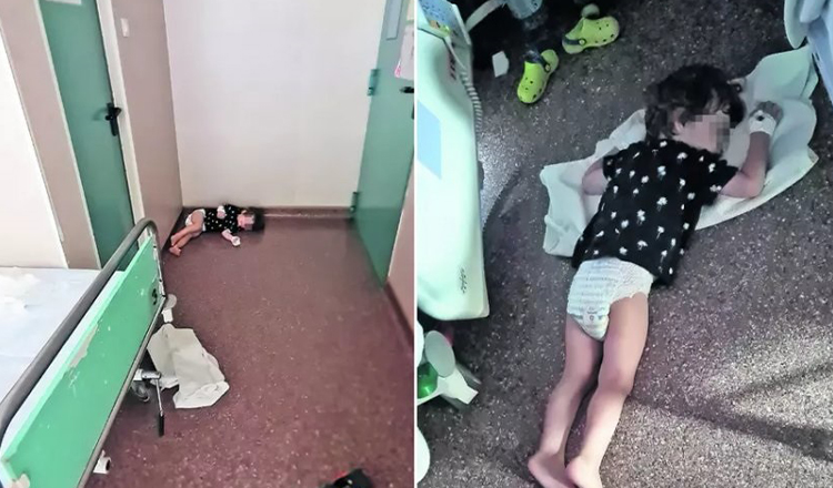 Strigator la cer! Un copil de trei ani doarme pe jos intr-un salon al Spitalului Grigore Alexandrescu din cauza caldurii insuportabile.